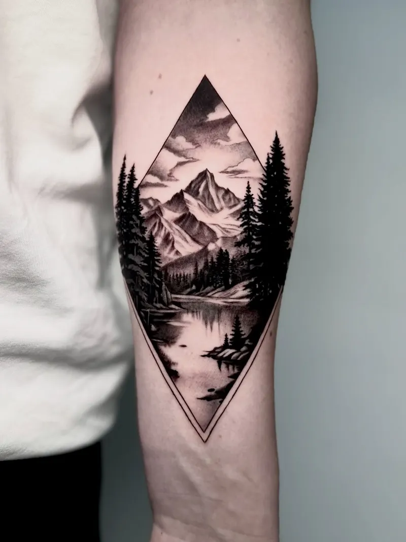 Mountain lake landscape inside a geometric diamond frame